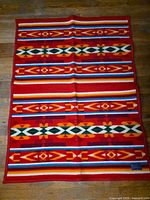 Full view of colorful Pendleton Beaver State wool lap blanket