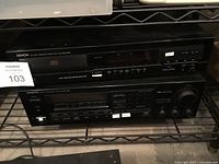 Denon DCD-660 and Onkyo tuner amplifier on shelf
