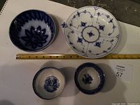 All four bowls with ruler for scale