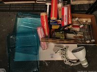 Lot overview showing trays, rollers, lamp, accessories