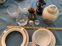 Group shot showing all items including pansy ring, ginger jar, vases, cut glass pieces, bowls, soup bowl and saucer