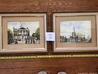Both framed watercolors side by side for scale and presentation