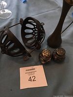 Overall lot view showing string holder, vase, and pair of shakers