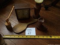 Group shot of all five items with tape measure for scale