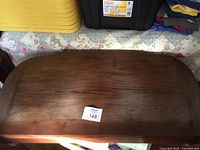 Folded tabletop full view showing finish and lot tag