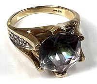 Ring angled showing mystic topaz and split shank