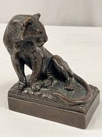 Front view bronze leopard sculpture on rectangular base