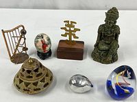 Group shot of all seven collectible items