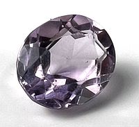 Front view of oval faceted pale purple gemstone