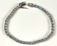 Full view oval-link sterling silver bracelet with opals