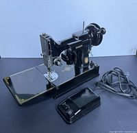 Singer 221K sewing machine with foot pedal and cord