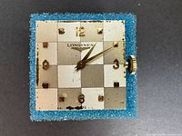 Front view of square Longines dial and hands