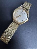 Full view of watch with bracelet extended