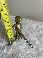 Front view with tape measure showing height around 4 inches