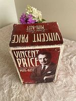 Front/top of retail box showing product name and image of Vincent Price