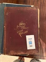 Front cover showing title and wear