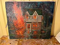 Front view of entire oil painting showing burning house scene on canvas