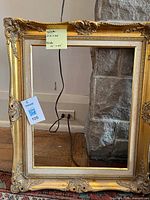 Full view of first ornate gold frame