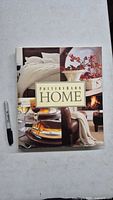 Front cover of Pottery Barn Home hardcover book with Sharpie for scale