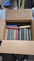 Box opened showing all 17 hardcover books