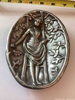 Top view showing full relief design on oval dish