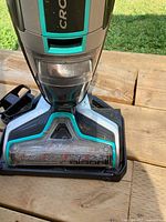 Front view showing Bissell CrossWave brush head and branding