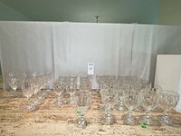 Overall lot of stemware on counter