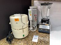 Group shot showing Osterizer blender, Braun juicer, Braun hand blender with box