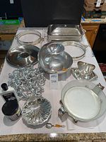 All serveware pieces arranged on table