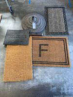 All four mats, umbrella base, extension piece displayed