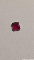 Front view of blood red octagon cut ruby