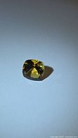 Front angled view of cushion cut golden citrine