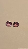 Pair of cushion pink spinels front view