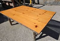 Top view showing cedar plank surface with knots