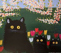 Close-up of cat figures and blossoms on lithograph