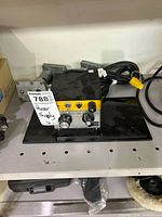 Front and top view of Bodine speed controller with cord