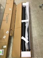 Screen casing and tripod packed in original box with foam protectors