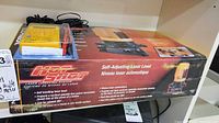 Johnson Hot Shot laser level kit box with multimeter packaged on top