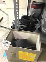 Safelight and stacked carrier plates in box