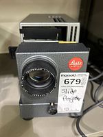 Front view showing lens, branding and body condition