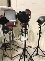 Three lights on stands, center item is the Type 4081 Mickey-Mole with barndoors