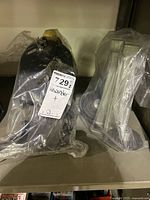 bagged black motor housing with yellow spindle cap and lot tag