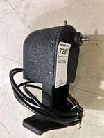 Overall view of Neumade PD film rewinder showing front and power cord