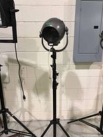 Full view of spotlight mounted on stand