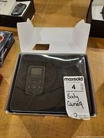 Camcorder in original box under plastic cover