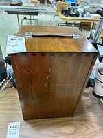 Wooden storage case exterior with leather handle