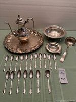 Full lot showing teapot, tray, bowls, spoons, ladle