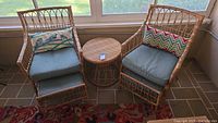 Overall set: two chairs, two footrests, side table with cushions and pillows