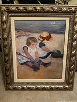 Framed Mary Cassatt print showing entire artwork and frame