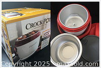 Box front and open warmer showing parts